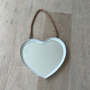White hanging heart mirror on a rope. Coastal.